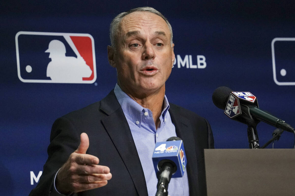 Major League Baseball commissioner Rob Manfred speaks during a news conference, Thursday March ...