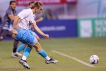 Las Vegas Lights Cal Jennings (26) takes a shot for a score against the Tacoma Defiance in the ...