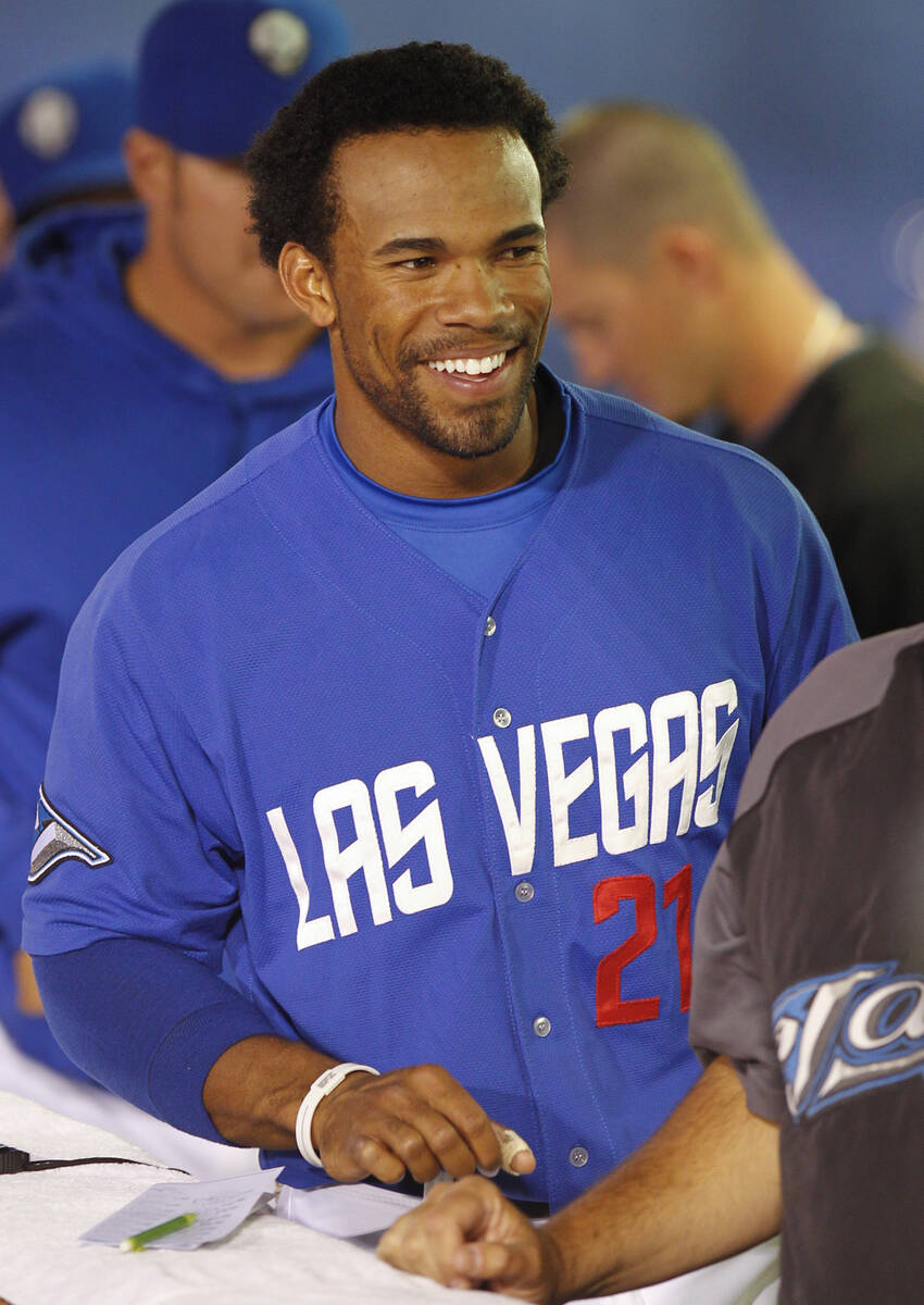 In this April 18, 2011, file photo, Las Vegas 51s outfielder Eric Thames talks to teammates dur ...