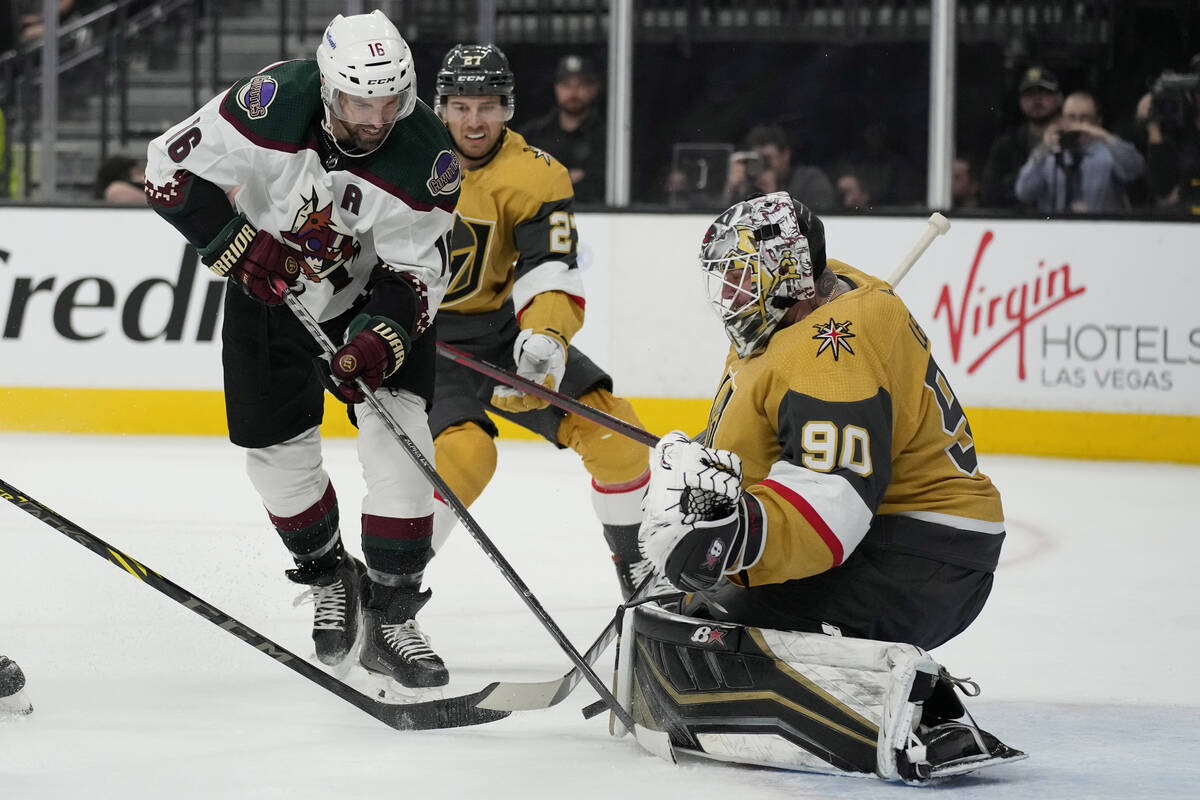 Vegas Golden Knights goaltender Robin Lehner (90) blocks a shot by Arizona Coyotes left wing An ...