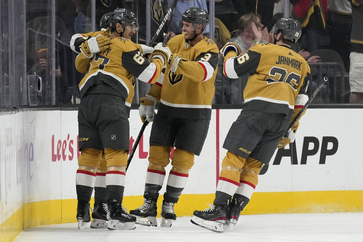 Vegas Golden Knights left wing Max Pacioretty, left, celebrates after scoring against the Arizo ...