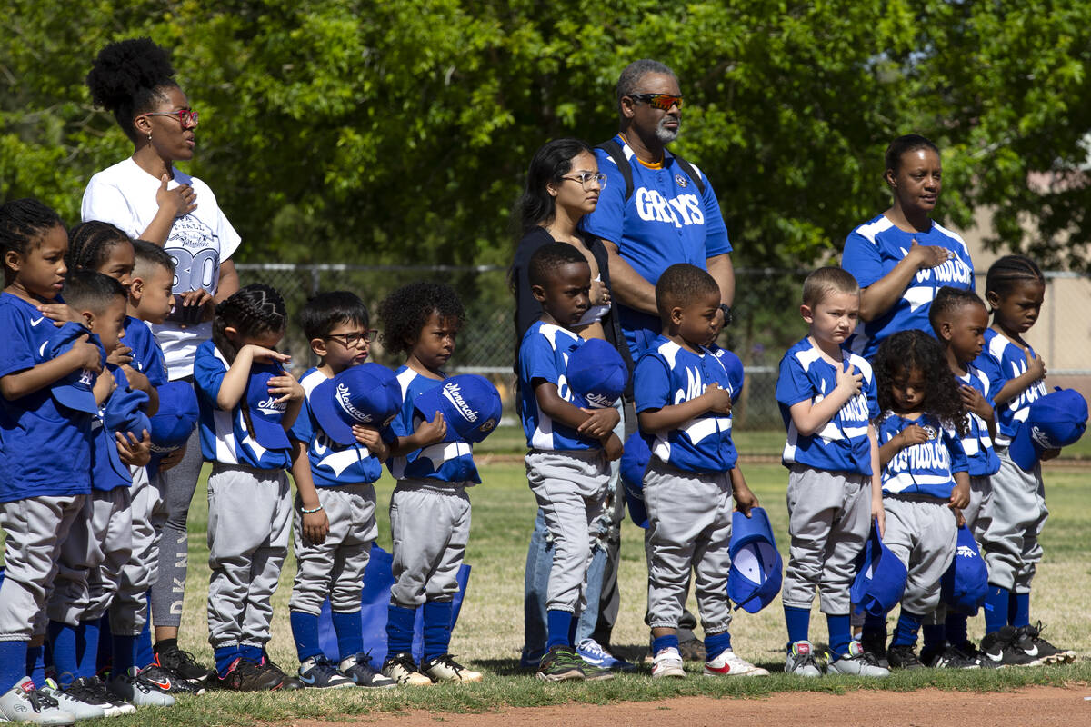 Bolden Little League players sing the National Anthem before Sheriff Joe Lombardo throws the fi ...