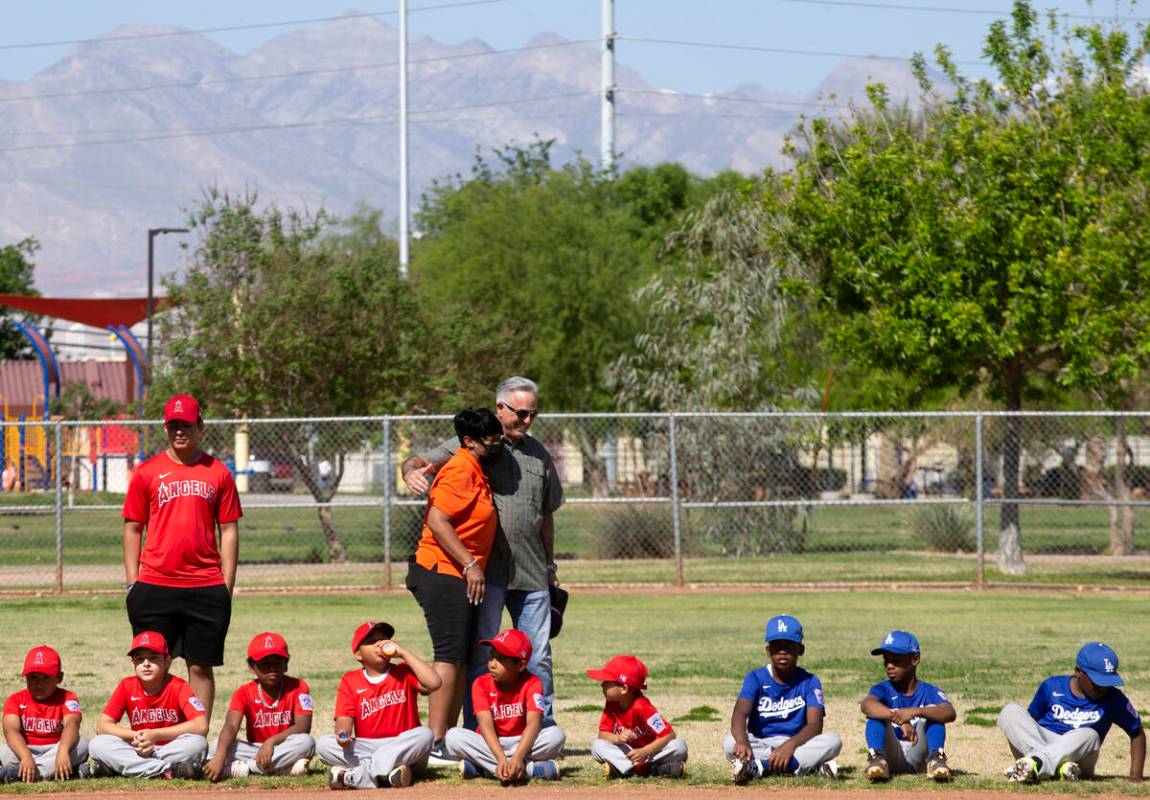 Sheriff Joe Lombardo interacts with players and coaches before throwing the first pitch at Bold ...