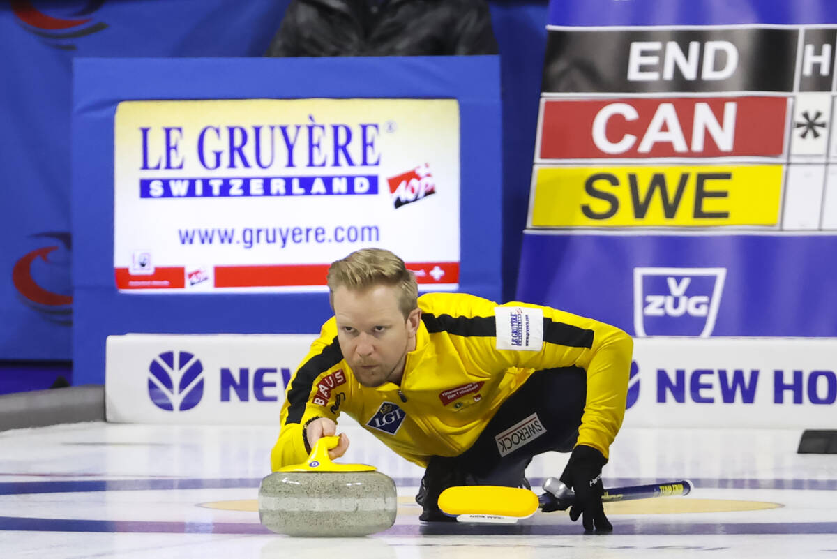 Sweden skip Niklas Edin delivers a stone against Canada in the gold medal game of the LGT World ...