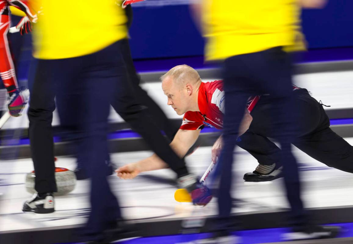 Canada’s Mark Nichols delivers a stone against Sweden in the gold medal game of the LGT ...