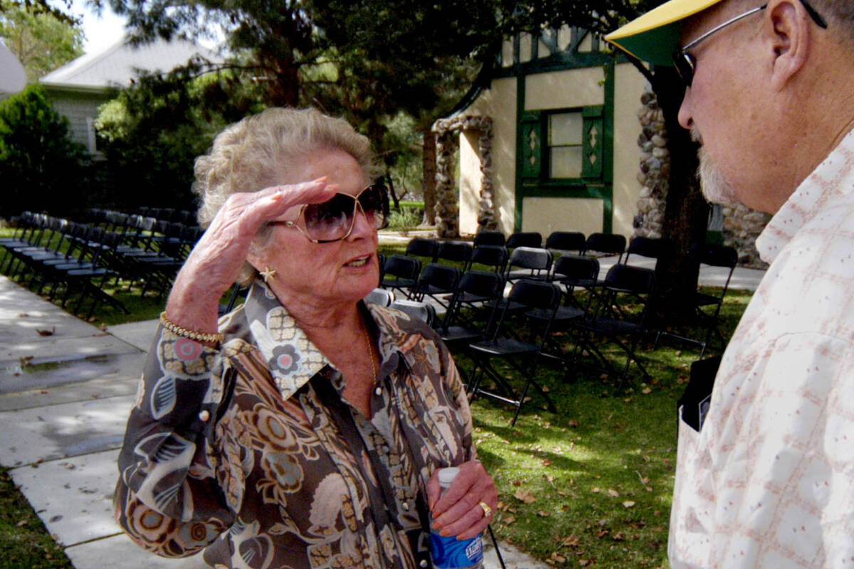 Former Alamo Aviation owner Peg Crockett, left, talks with Ed Huffman at the Clark County Women ...