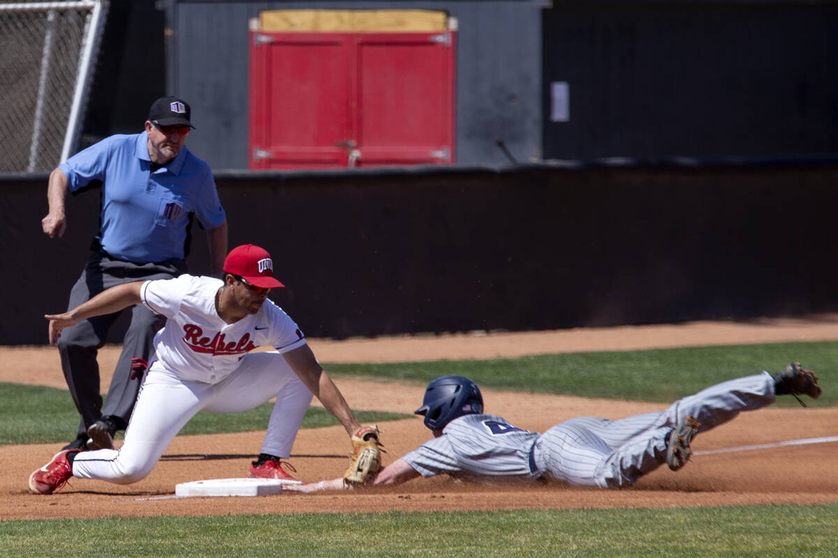 UNLV infielder Diego Alarcon (6) makes an out against UNR outfielder Patrick Caulfield (4) duri ...