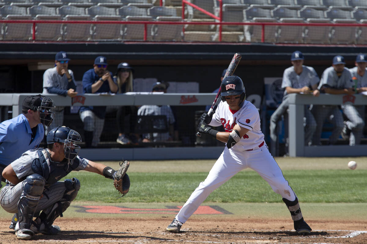 UNLV infielder Jordan Andrade (4) bats against UNR during an NCAA baseball game at Earl Wilson ...