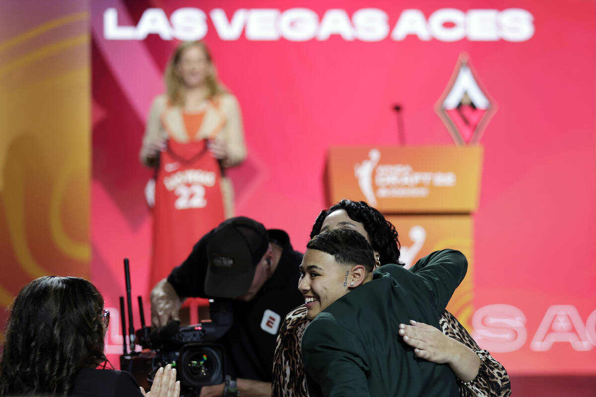 Florida Gulf Coast's Kierstan Bell reacts after being selected by the Las Vegas Aces as the 11t ...
