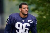 New England Patriots defensive end Tashawn Bower arrives at an NFL football practice, Wednesday ...