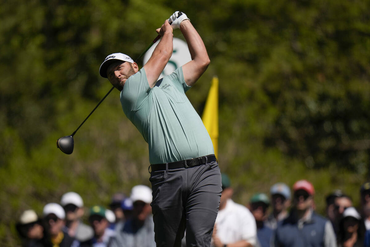 Jon Rahm, of Spain, tees off on the fifth hole during the final round at the Masters golf tourn ...