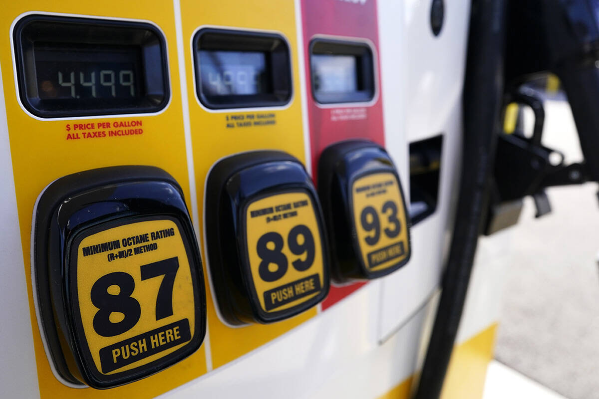Gasoline prices are displayed at a gas station in Vernon Hills, Ill., Friday, April 1, 2022. I ...
