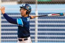 Centennial’s Rick Kurosawa (2) drives a ball to left field during a boys high school bas ...