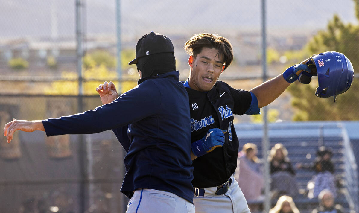 Sierra Vista’s J.T. Starkus (9) celebrates after hitting a home run during a boys high s ...