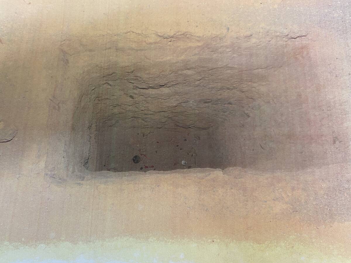 Authorities suspect this hole was a planned grave for slain child Mason Dominguez. The hole was ...