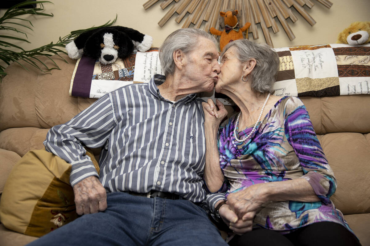 Jimmie Joe Monroe, 88, left, and his wife Florrine Enns, 85, pose for a phot at their Henderson ...