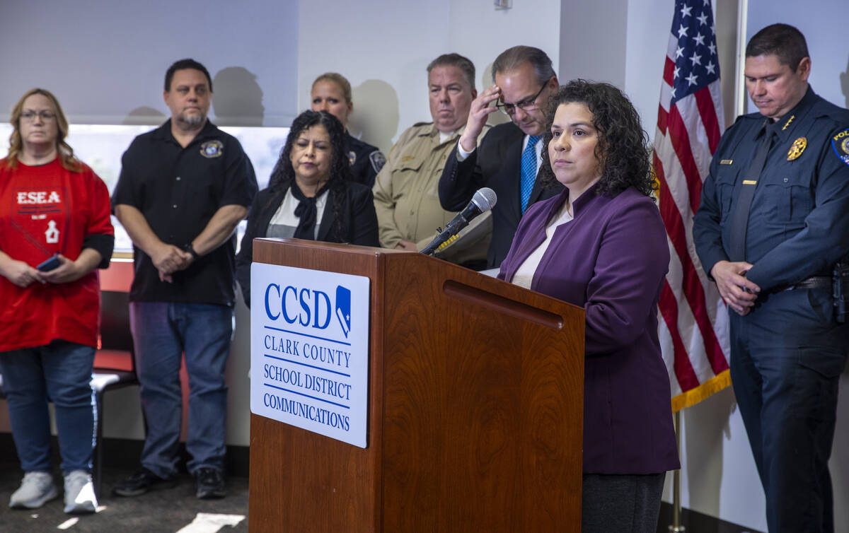 Clark County School District Board of School Trustee Member Evelyn Garcia Morales speaks beside ...