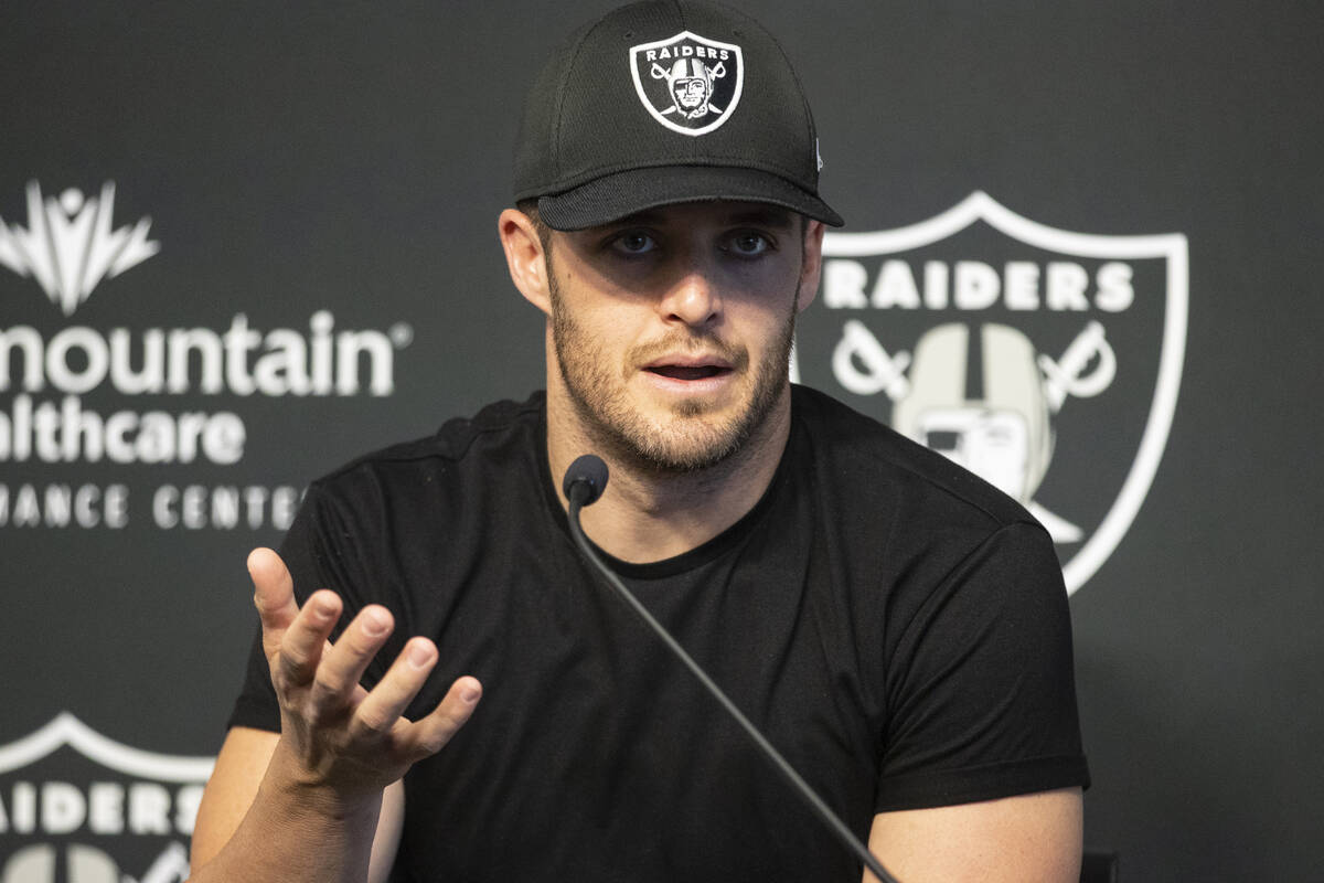 Raiders quarterback Derek Carr speaks on his three-year contract extension during a press confe ...