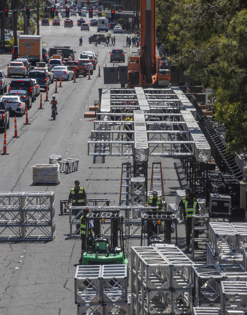 Construction workers assemble metal sections as work has started on the NFL red carpet draft st ...