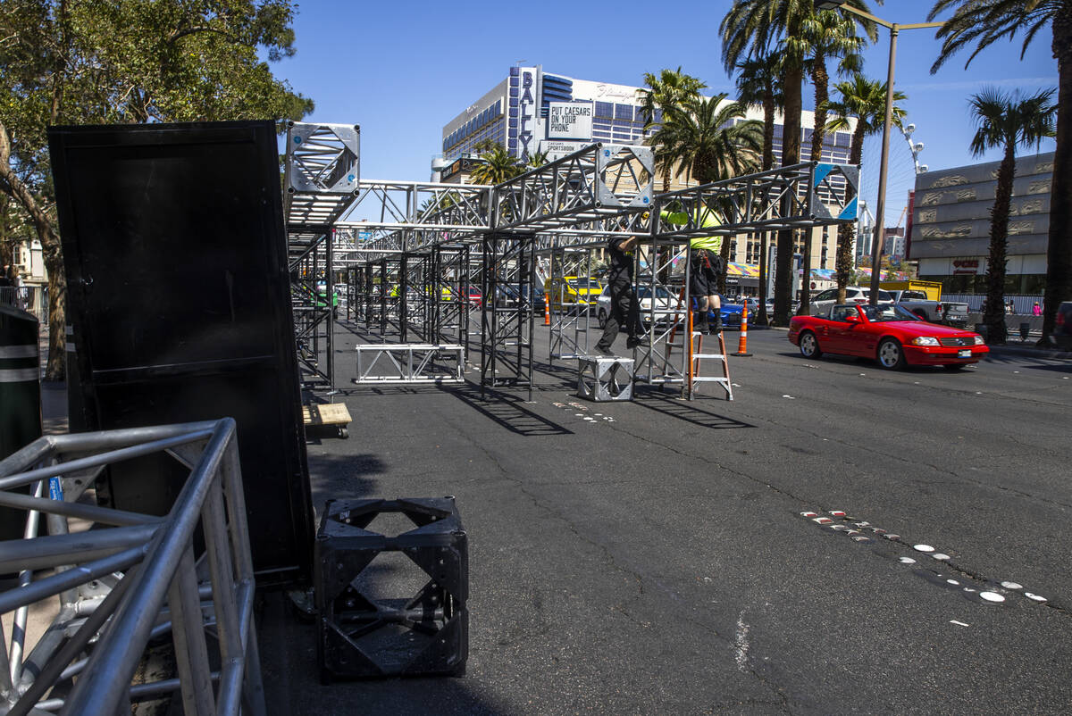 Construction workers assemble metal sections as work has started on the NFL red carpet draft st ...