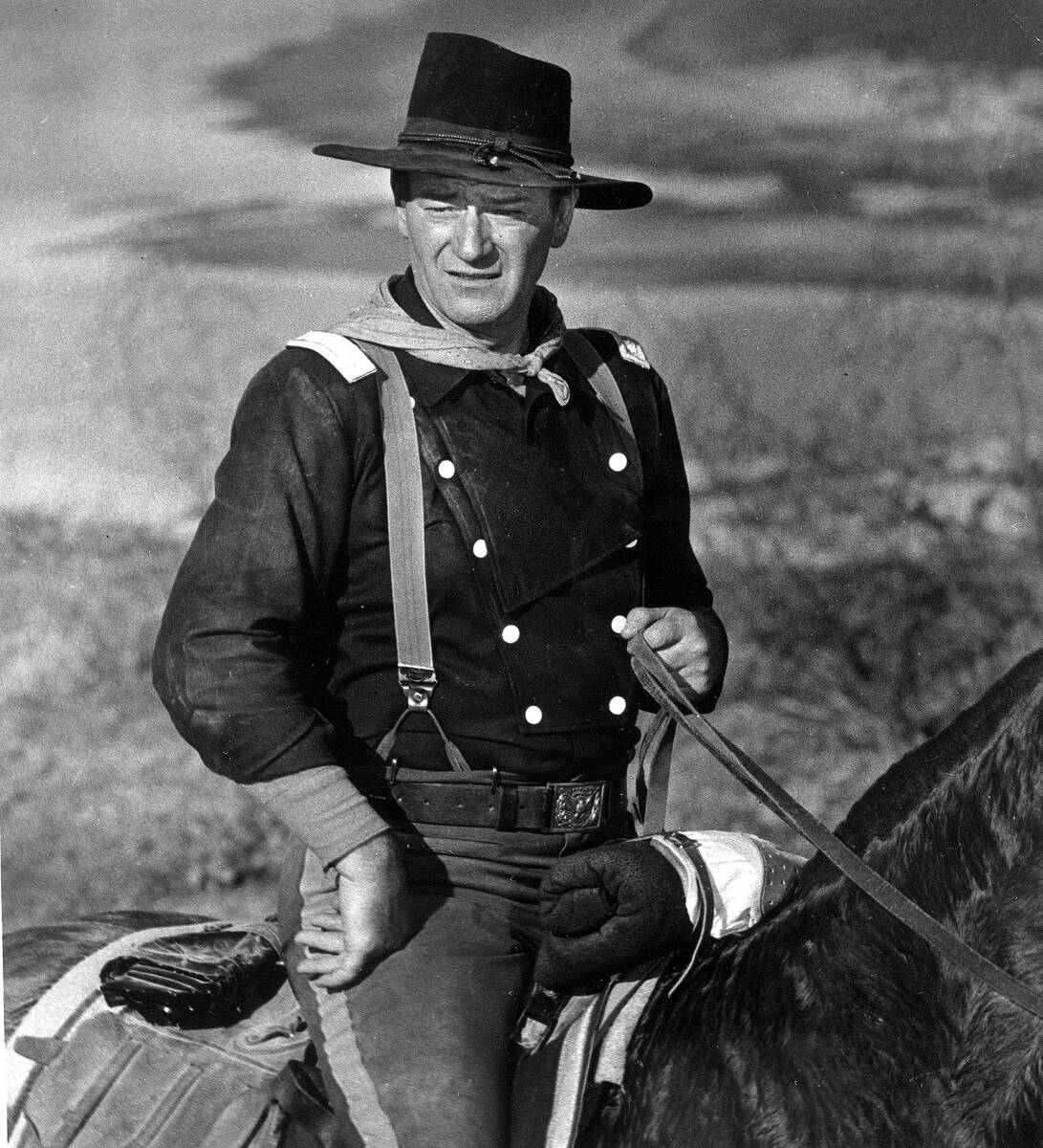 John Wayne is shown during the filming of "The Horse Soldiers." (AP Photo)