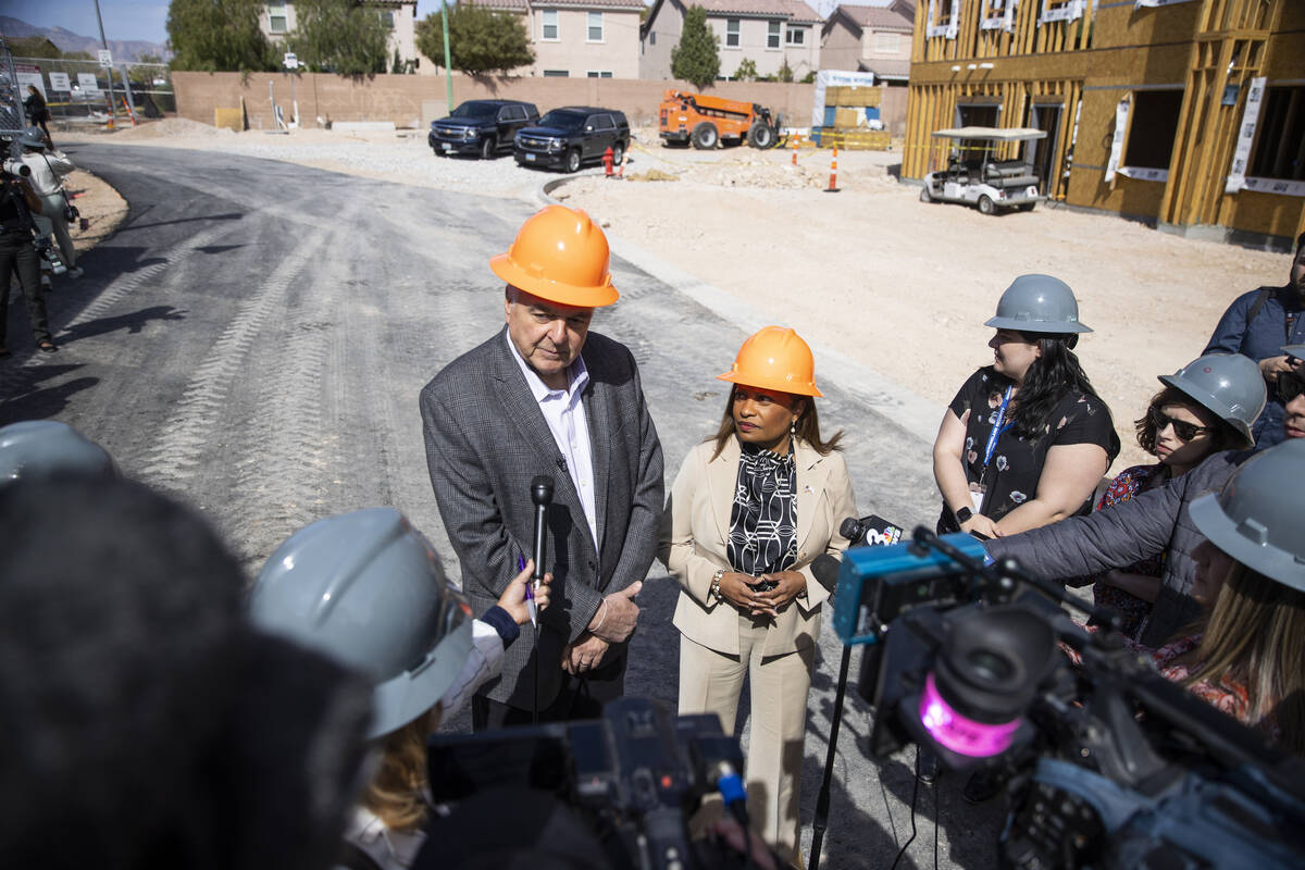 Governor Steve Sisolak, left, and U.S. Department of Housing and Urban Development Deputy Secre ...