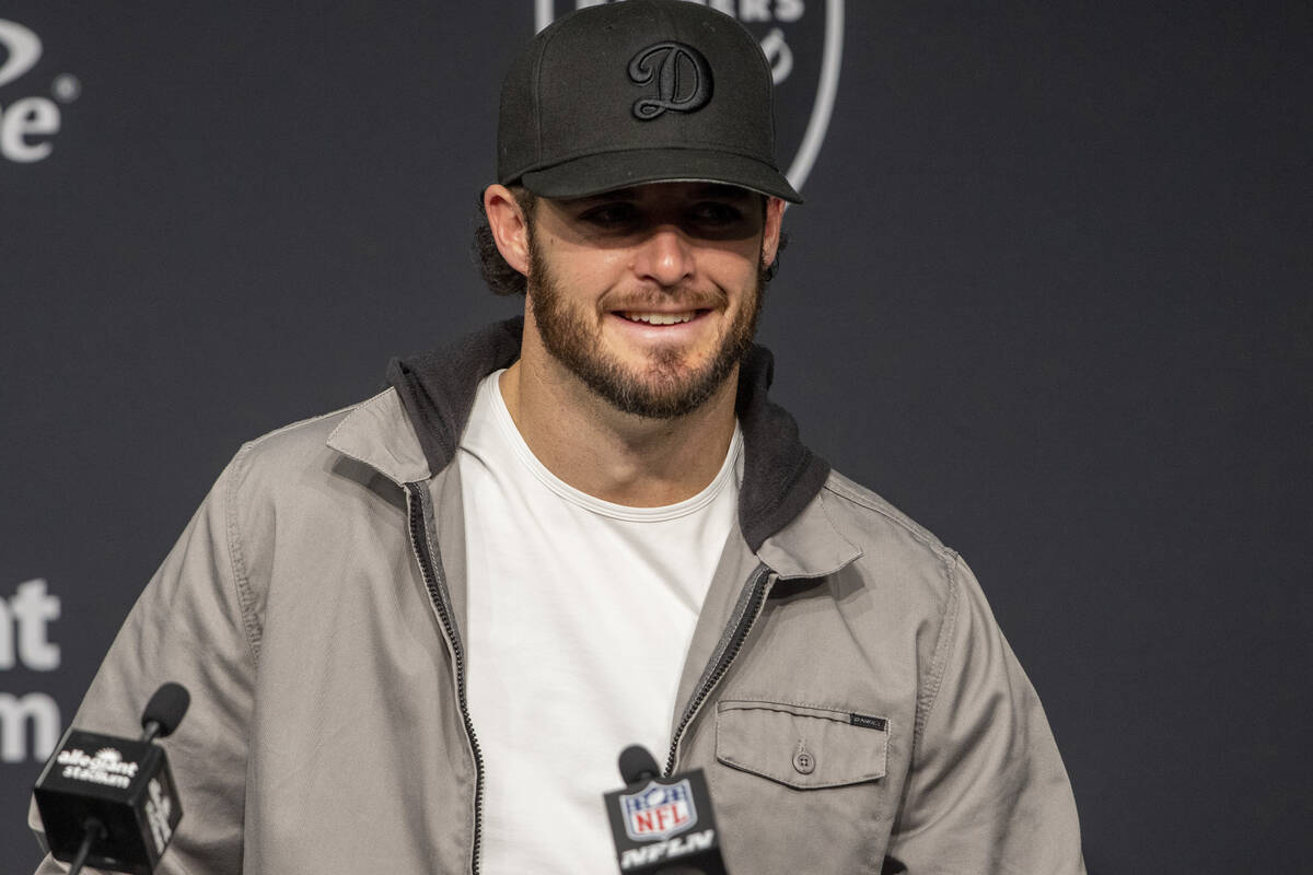 Raiders quarterback Derek Carr speaks with the media during a postgame news conference after th ...