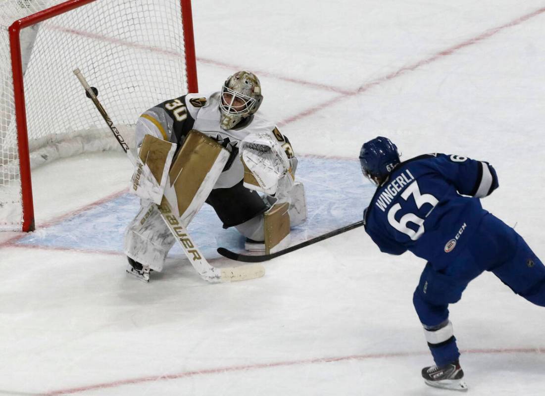 Colorado Eagles right wing  Andreas Wingerli (63) scores a goal against Henderson Silver Knigh ...