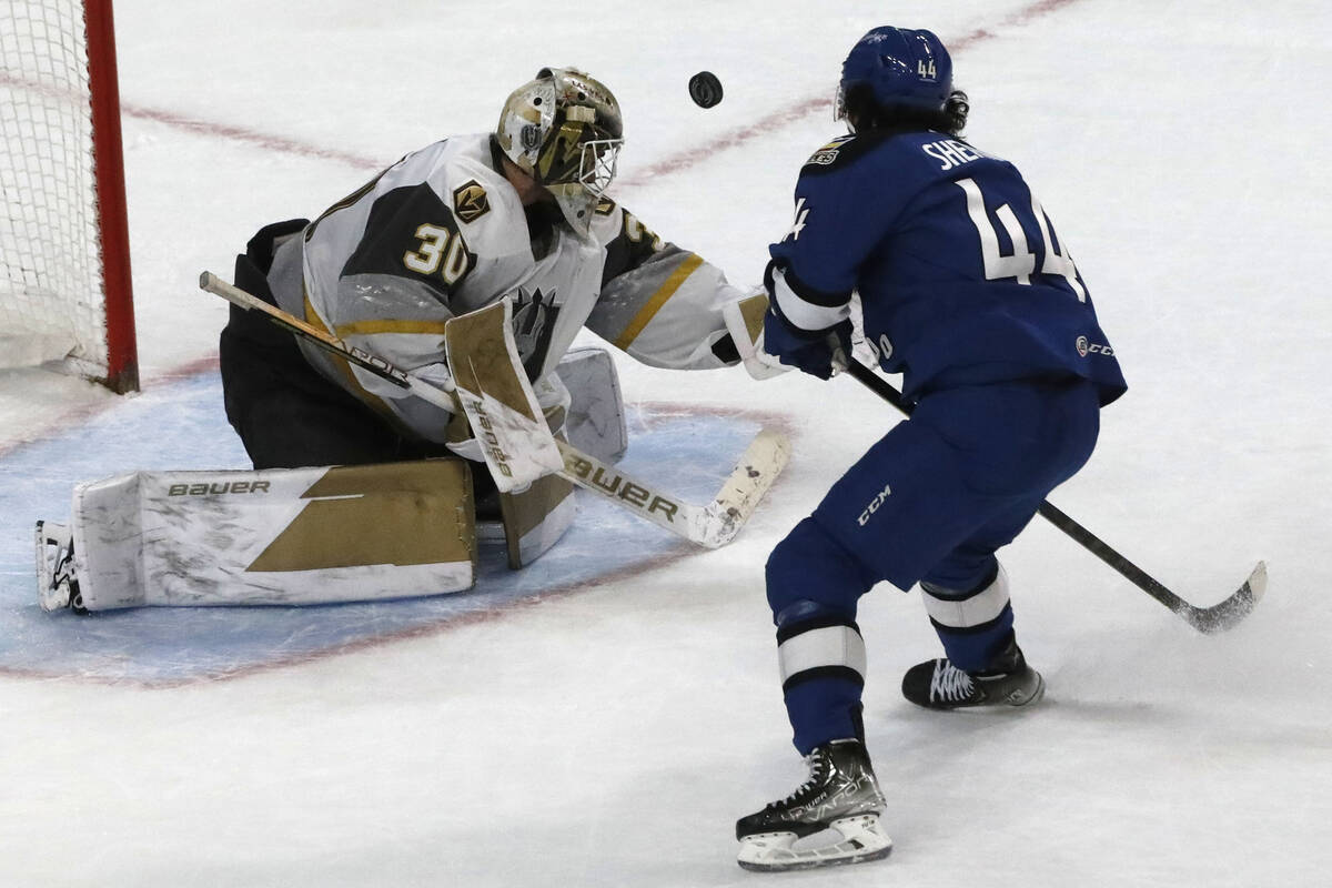 Henderson Silver Knights goalie Jiri Patera (30) makes a save against Colorado Eagles right wi ...