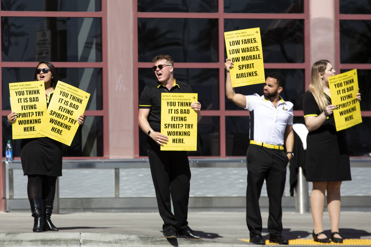 Spirit Airlines flight attendants protest outside Harry Reid International Airport on Friday, A ...