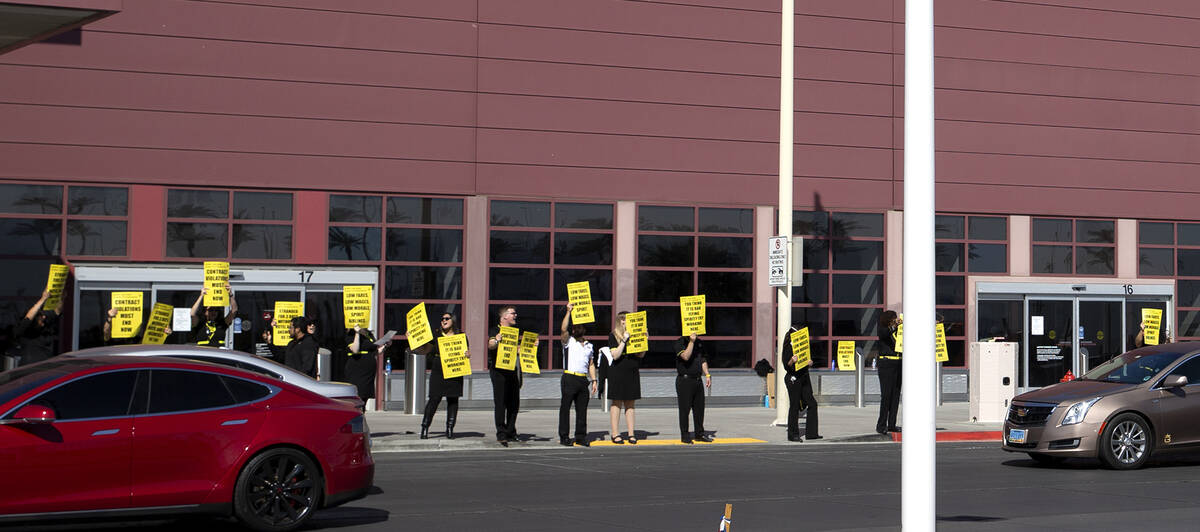 Spirit Airlines flight attendants protest outside Harry Reid International Airport on Friday, A ...
