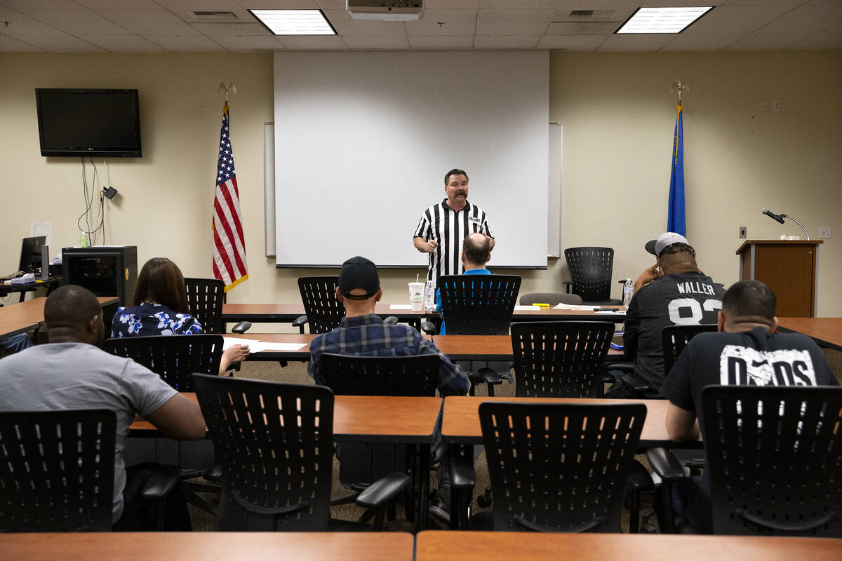 Pastor Troy Martinez holds a meeting for Dads in Schools at the Enterprise Area Command Metropo ...