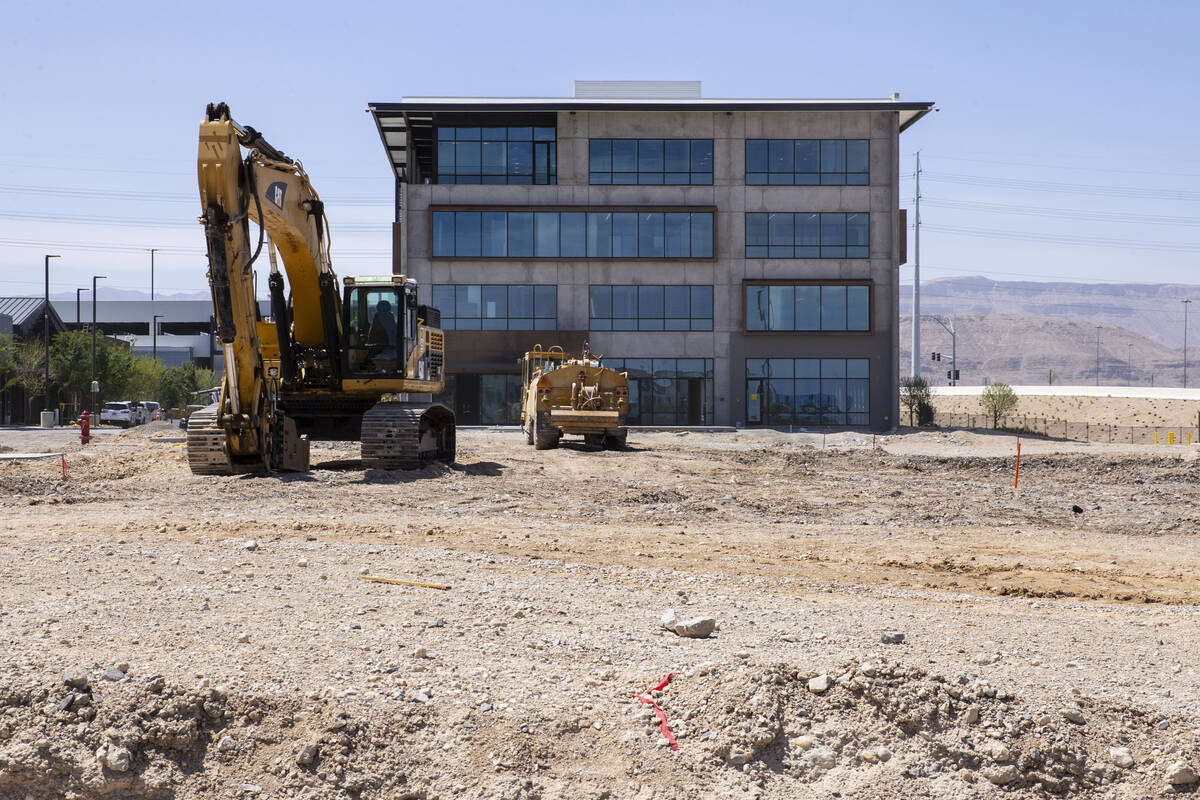 Heavy construction equipments are seen on the construction site where the second phase of UnCom ...