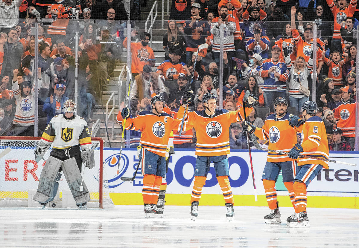 Vegas Golden Knights goalie Logan Thompson (36) looks on as Edmonton Oilers' Connor McDavid (97 ...