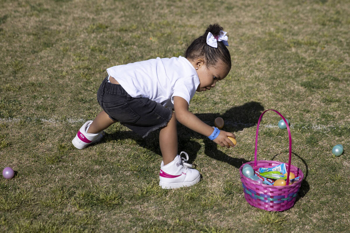 Milani Jordan, 3, participates during the Hoppy Egg Run community event at the Walnut Recreatio ...
