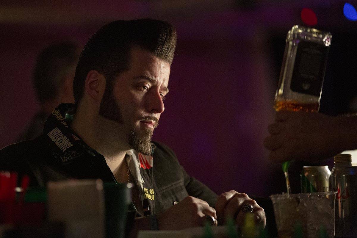 Adam Szeluga, of Rochester, New York, waits for his drinks during Viva Las Vegas Rockabilly Wee ...
