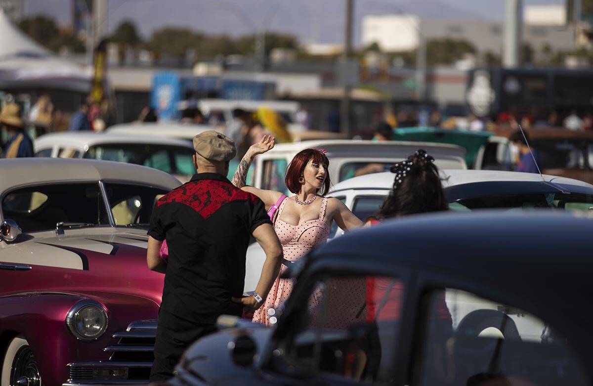 Attendees socialize during the Rockabilly Car Show at Viva Las Vegas Rockabilly Weekend on Satu ...