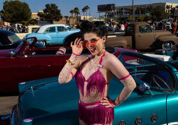 Las Vegas native Abby Dandy poses for photos in front of classic cars during the Rockabilly Car ...
