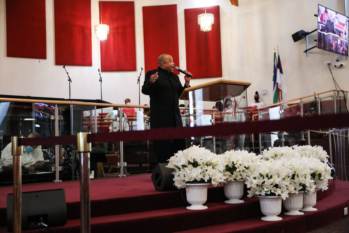 The Rev. Sean Taylor delivers a sermon for the Easter service at Victory Baptist Church in Las ...