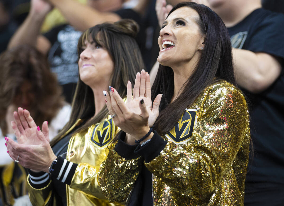 Golden Knights fans cheer for Vegas during an NHL hockey game against the New Jersey Devils on ...