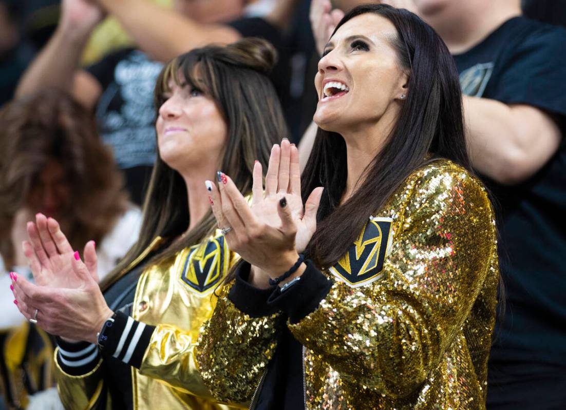 Golden Knights fans cheer for Vegas during an NHL hockey game against the New Jersey Devils on ...