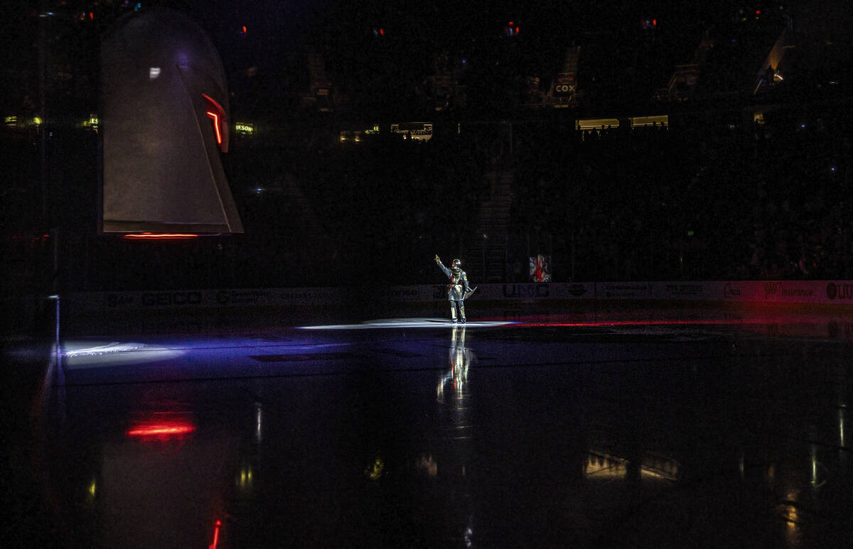The Golden Knight fires up the crowd before the start of an NHL hockey game against the New Jer ...