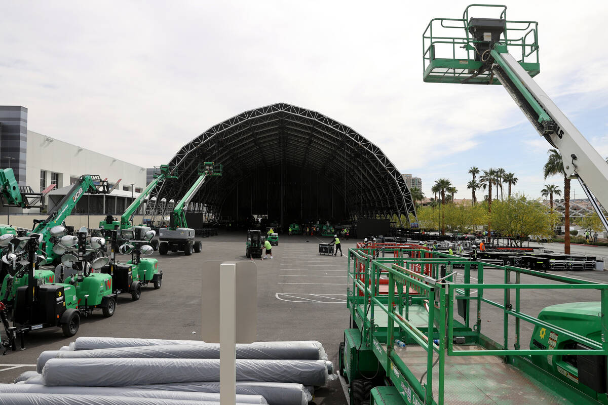 The main stage at the NFL Draft Experience under construction behind The Linq Hotel in Las Vega ...