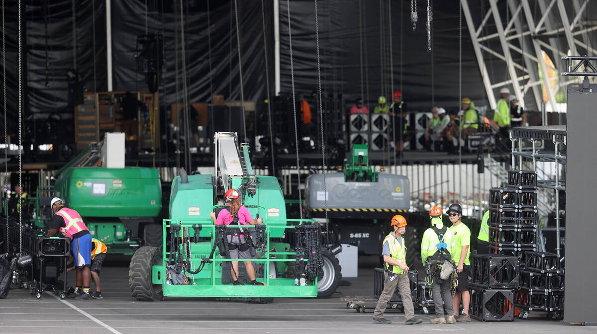 The main stage at the NFL Draft Experience under construction behind The Linq Hotel in Las Vega ...