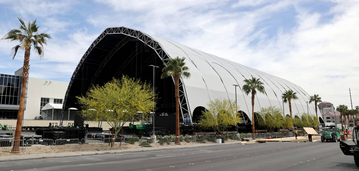The main stage at the NFL Draft Experience under construction behind The Linq Hotel in Las Vega ...