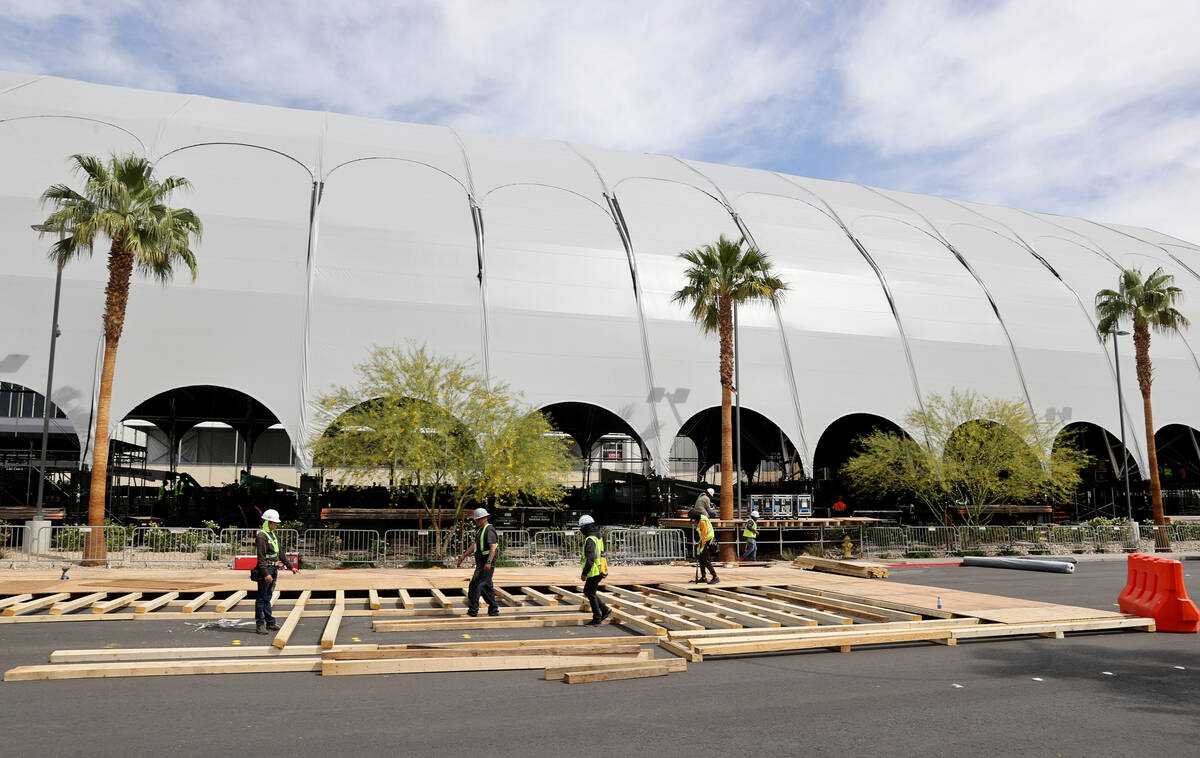 The main stage at the NFL Draft Experience under construction behind The Linq Hotel in Las Vega ...