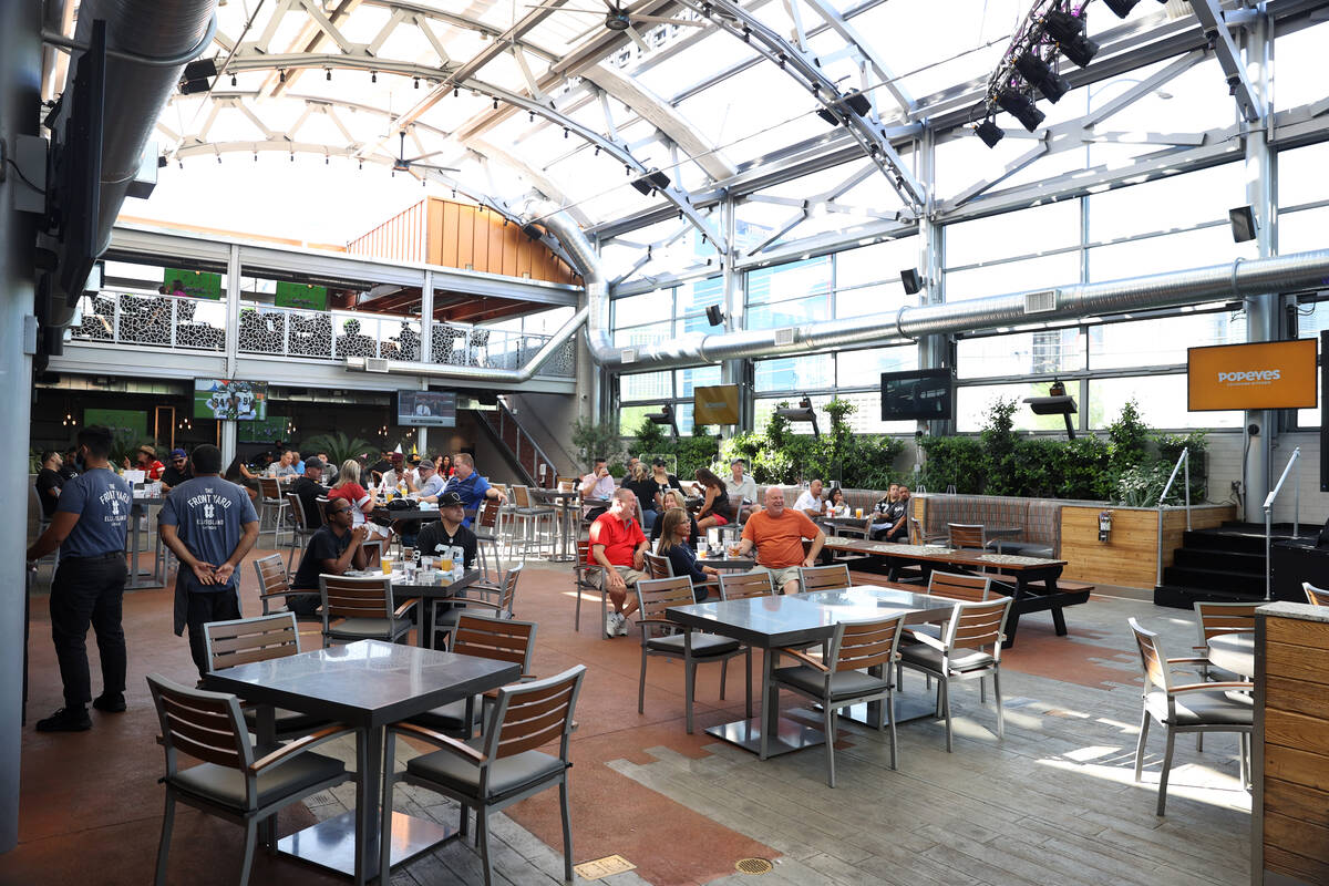 Customers watch a Raiders game at The Front Yard inside of the Ellis Island hotel-casino in Las ...