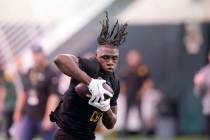 Cornerback Kalon Barnes catches during Baylor's college football NFL Pro Day in Waco, Texas, We ...