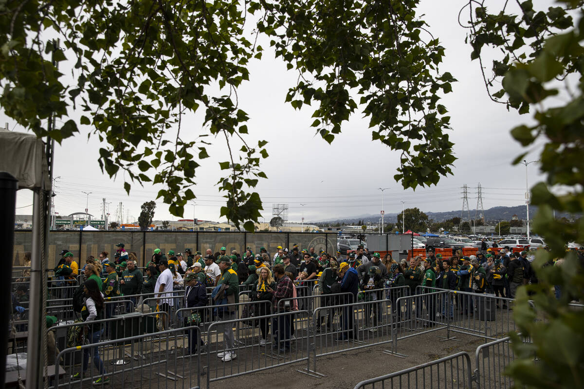 Oakland Athletics fans line up for the opening night game against the Baltimore Orioles on Mond ...