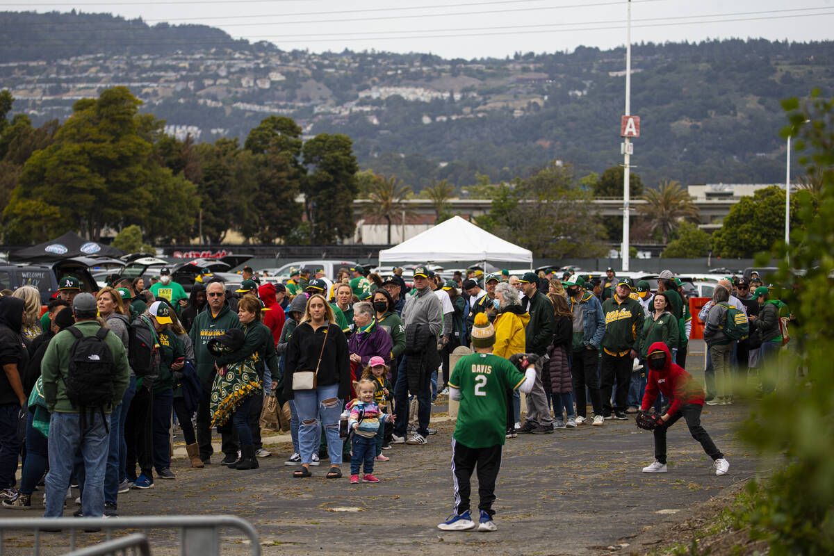 Oakland Athletics fans line up for the opening night game against the Baltimore Orioles on Mond ...